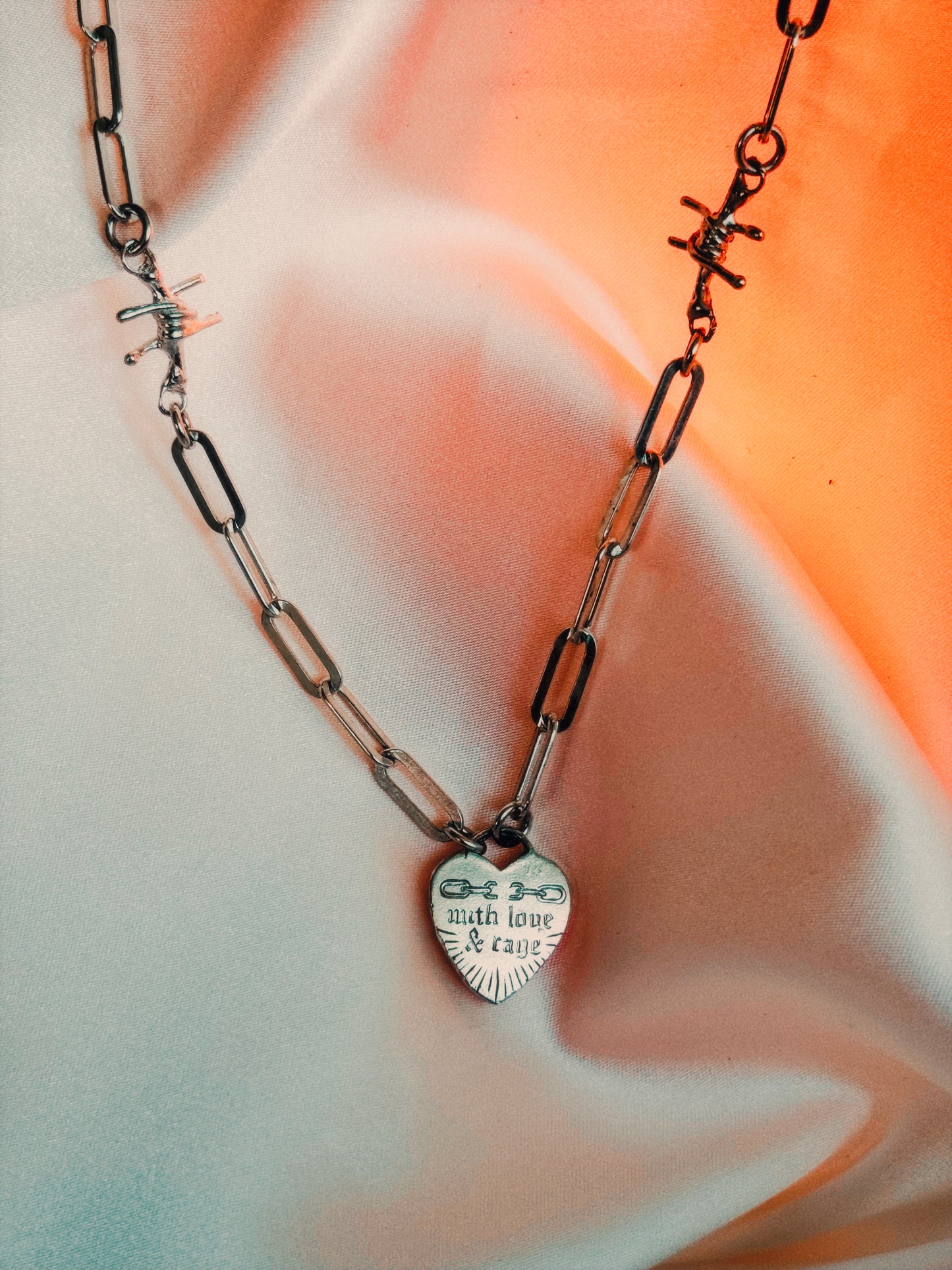 'With Love + Rage' Silver Heart Necklace