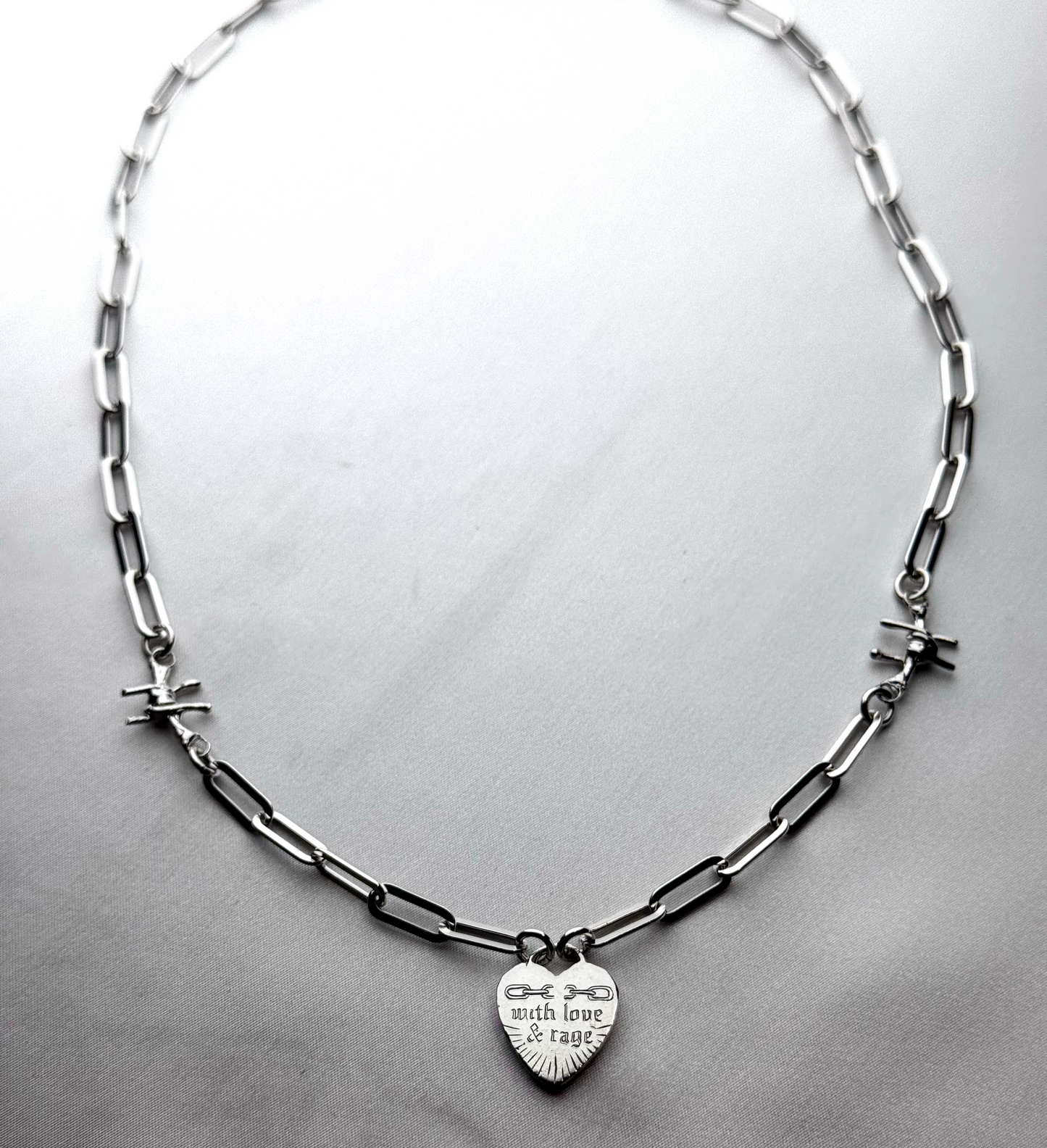 'With Love + Rage' Silver Heart Necklace